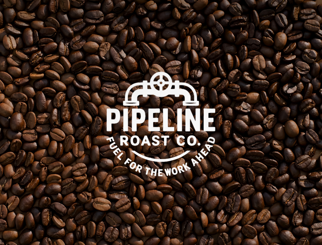 Pipeline Roast Co. logo displayed over a background of roasted coffee beans, symbolizing small-batch, industrial-strength flavor and the brand’s commitment to fresh coffee.