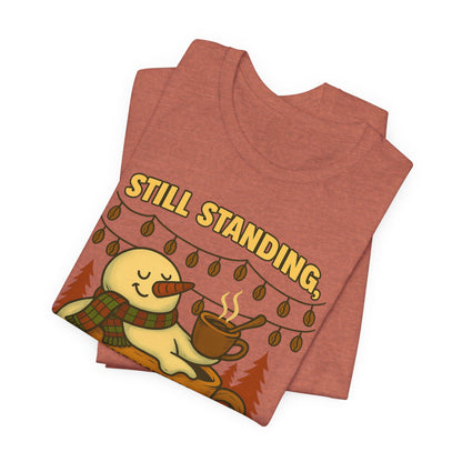Still Standing, Still Brewing Snowman Coffee Tee – Funny Winter Shirt